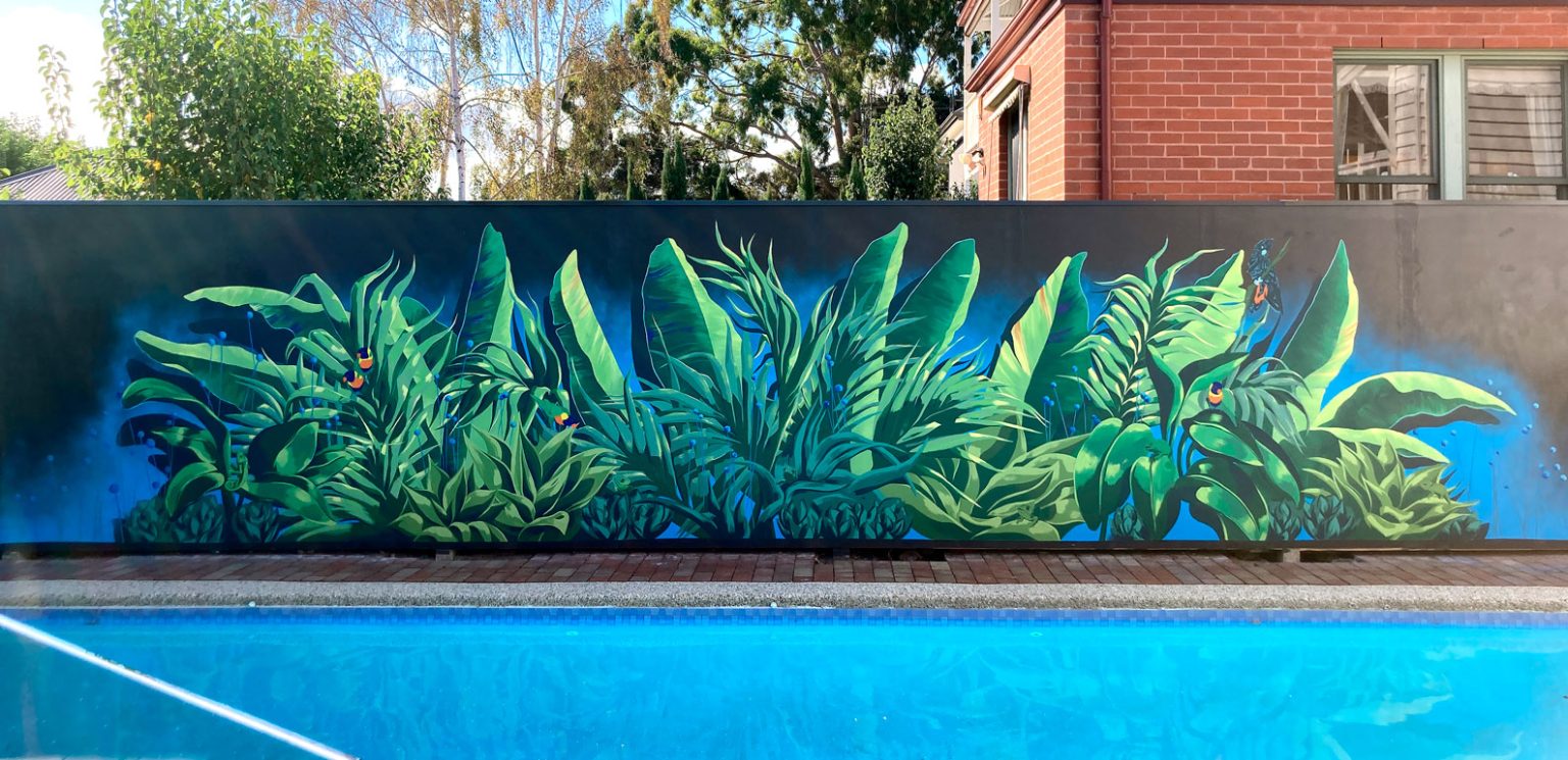 Green jungle painting by pool